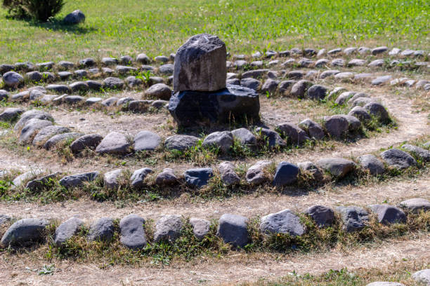 istock Labyrinth of stones in summer 1034242184