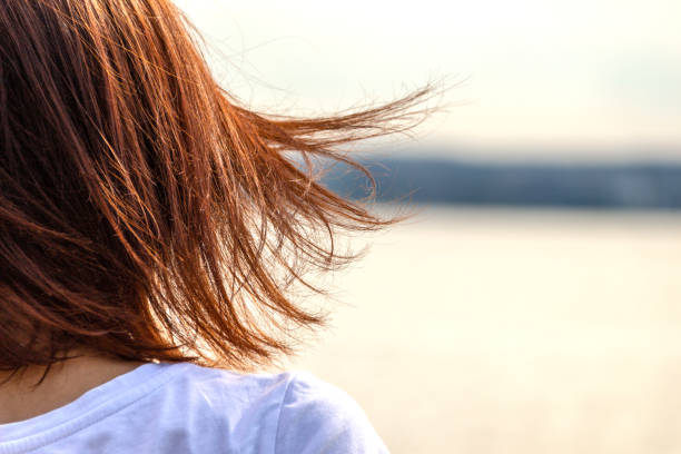 istock Developing hair in the wind against the sea 1034244578