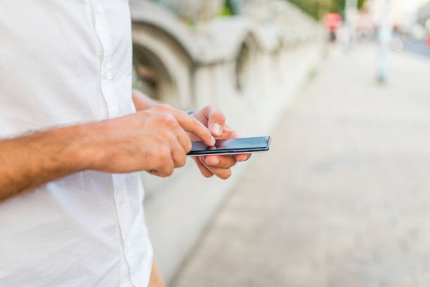 istock Student sending a text outside at the university 1034244620