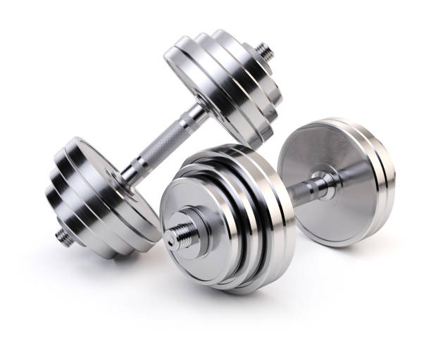 dos pesas de cromo aisladas en fondo blanco. equipos deportivos. - barbell weights dumbbell sport fotografías e imágenes de stock