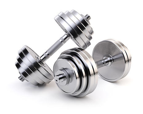 Two chrome dumbbells isolated on white background. Sporting equipment.