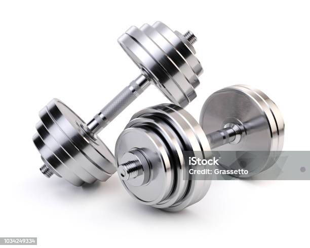 Two Chrome Dumbbells Isolated On White Background Sporting Equipment Stock Photo - Download Image Now