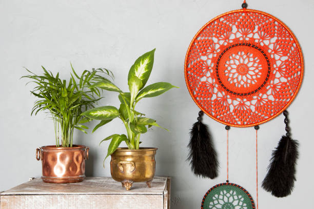 Dream catcher on gray background.