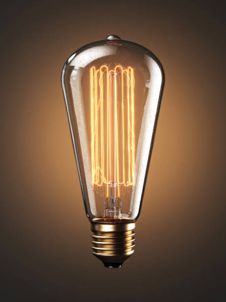 istock Old bulb lamp filament on light background 1034252828