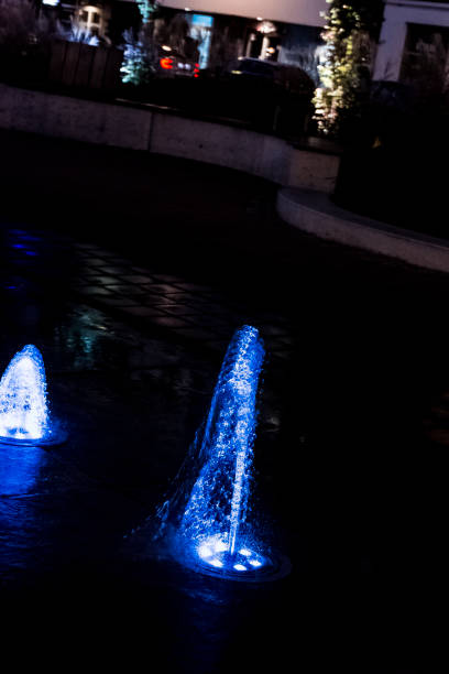 istock Illuminated water splash by night in  Gdynia, Tricity, Poland 1034253182