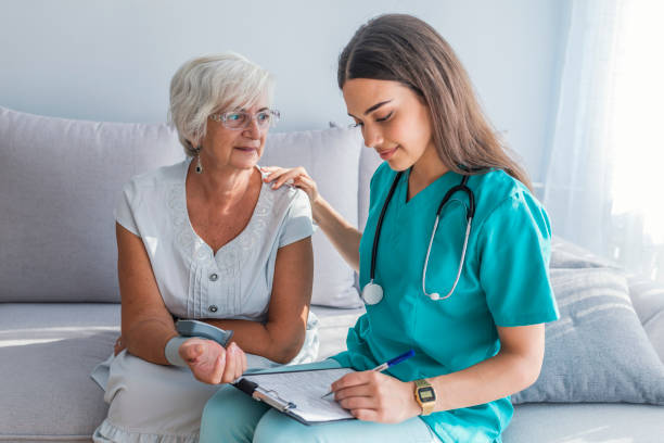 istock Older person is having blood pressure checked 1034253692