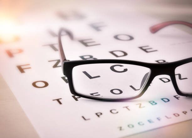 istock Glasses of sight on alphabet letter elevated view 1034257102