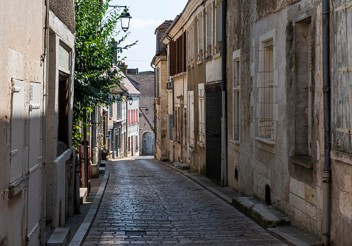 Narrow street with old houses in wine village Sancerre, Cher, France.