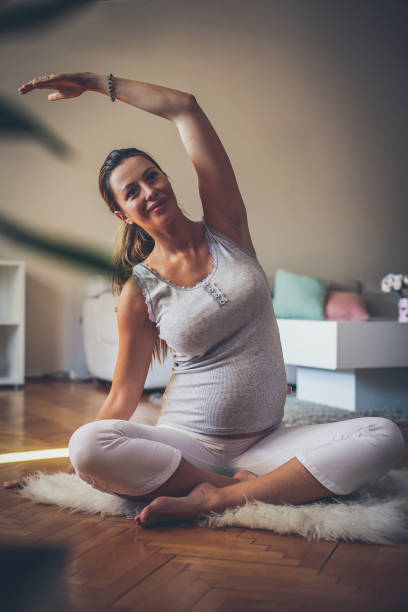 istock Young woman exercise at home. Woman working exercise. 1034264464