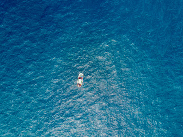 aerial view of commercial fishing boat - recreational boat small nautical vessel sea imagens e fotografias de stock