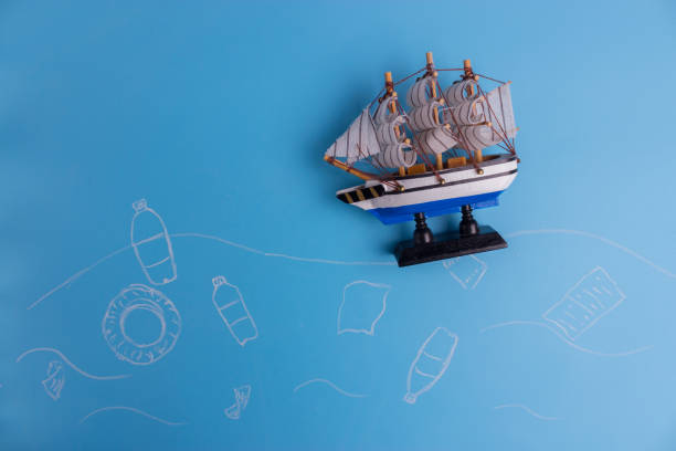 istock ocean Pollution concept. plastic bottles on blue background 1034275866