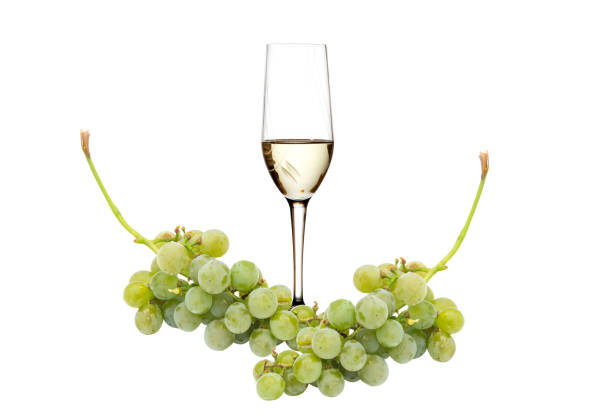 istock Green grape with white wine isolated on white background 1034280488