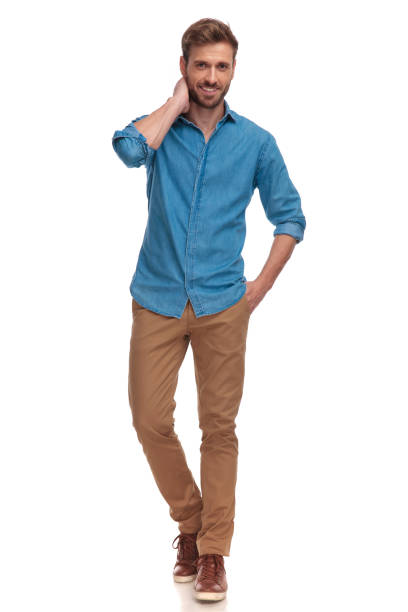istock young casual man standing and posing on white background 1034282952