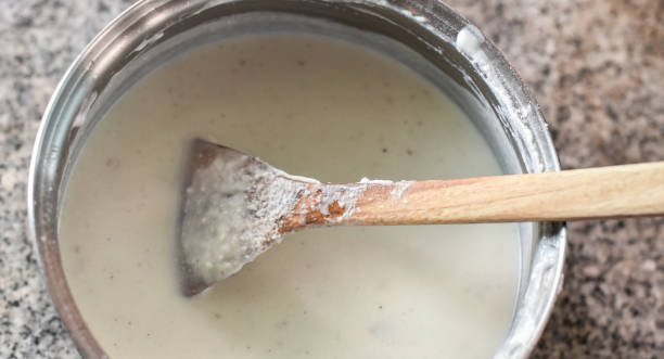 istock Prepare white sauce in hot pot 1034282956