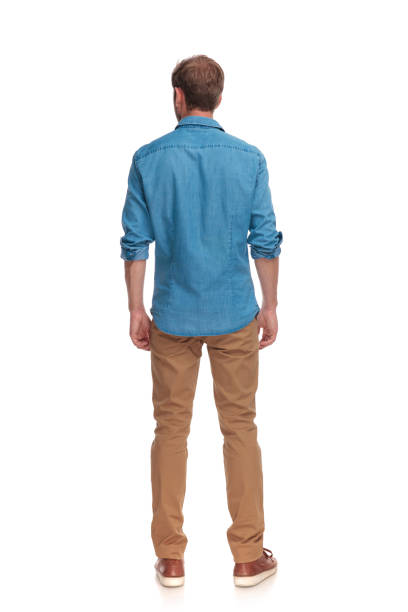 istock back view of a casual man standing 1034284666