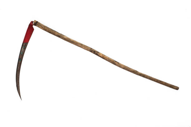 rusted metal scythe isolated on a white background