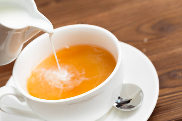 Cup of morning tea Cup of morning tea hot tea with evaporated milk and sugar. stock pictures, royalty-free photos & images