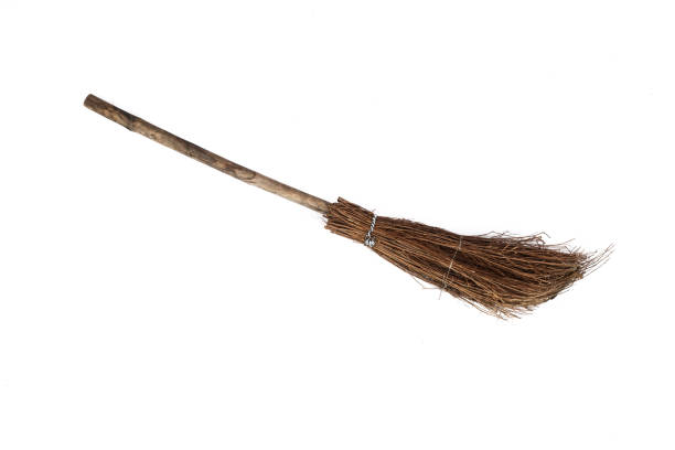 old sweeping broom , white background old sweeping broom , white background broom photos stock pictures, royalty-free photos & images