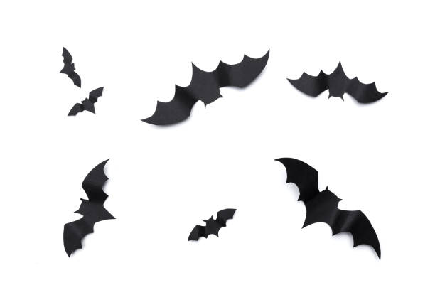 istock halloween and decoration concept - paper bats flying 1034294822