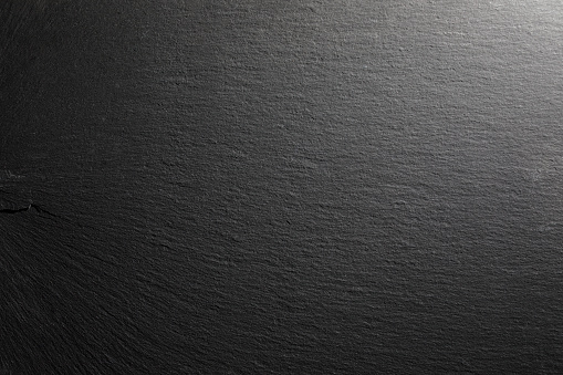 Dark grey black slate background or textureDark grey black slate background or texture