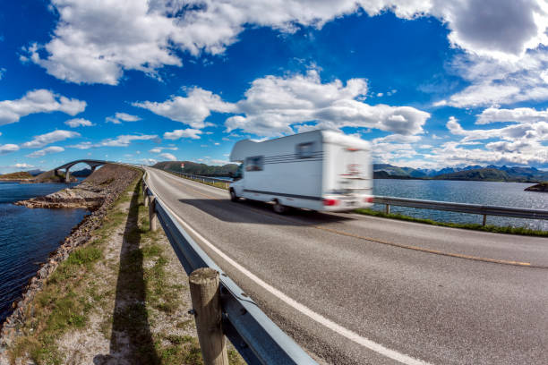 istock Norway. Caravan car travels on the highway. 1034301748