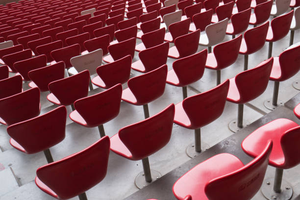 istock Empty orange seats at stadium,Rows of seat 1034306252