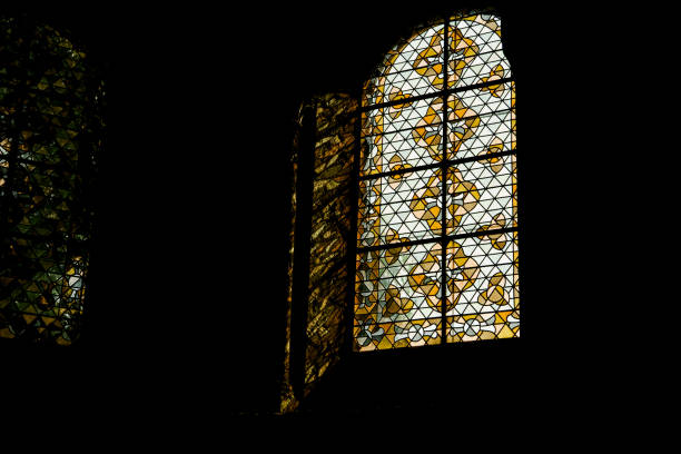 istock Stained-glass window in gothic church 1034306302