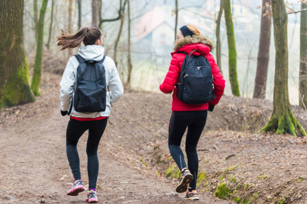 istock Two friends hiking together 1034309962