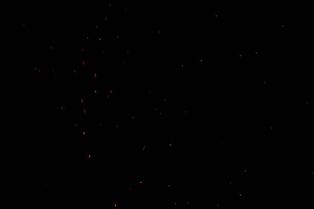 istock bonfire spark in the dark sky in night, shallow focus 1034310750