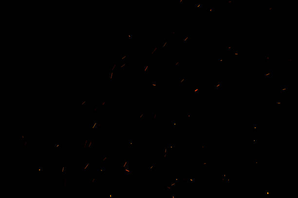 istock bonfire spark in the dark sky in night, shallow focus 1034310762