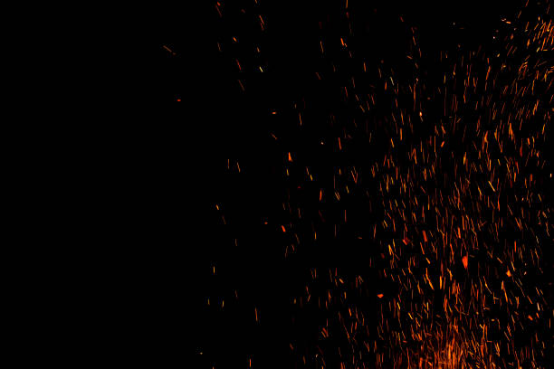 istock bonfire spark in the dark sky in night, shallow focus 1034310788