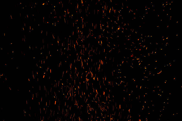 bonfire spark in the dark sky in night, shallow focus