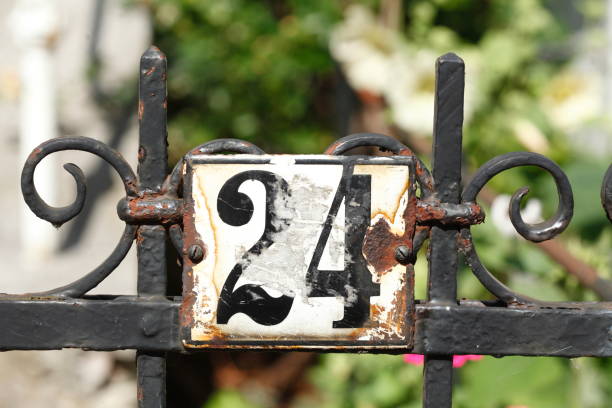 istock House number plate number twenty-four 1034314800