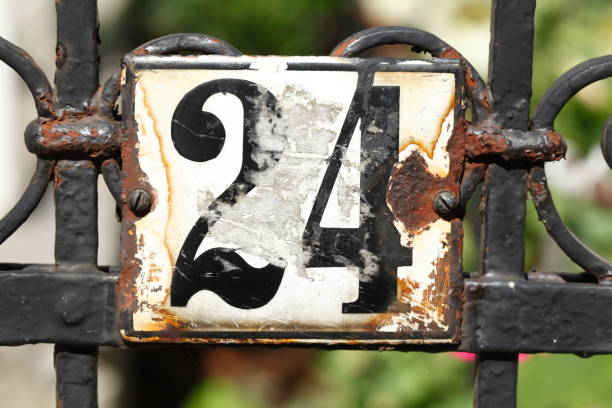 istock House number plate number twenty-four 1034314816
