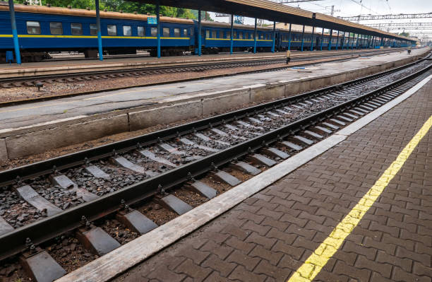 istock railway track at the station 1034314962