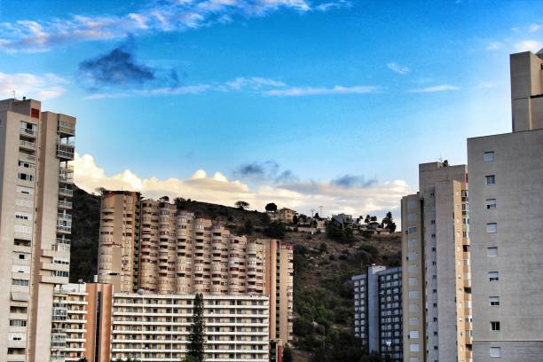 istock Benidorm city panoramic view one summer day at sunset 1034318350