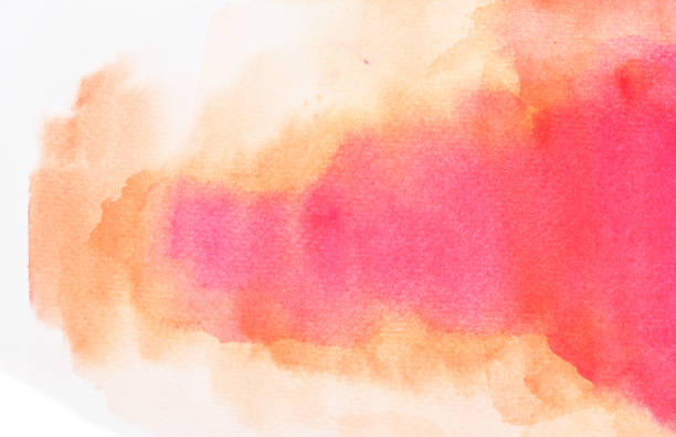 istock Brown with red and pink color stains flow on white surface 1034318596