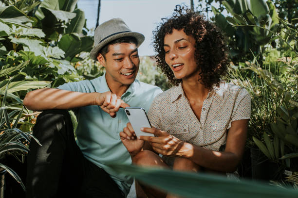 istock Friends looking at a phone 1034322756