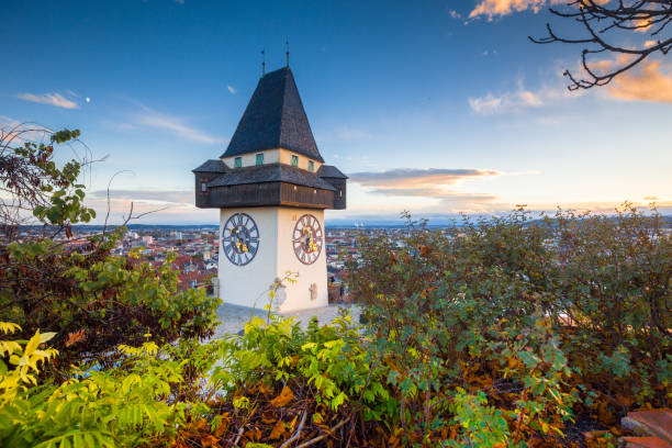 istock Graz clock tower at sunset, Graz, Styria, Austria 1034326858
