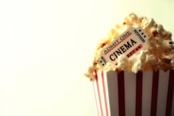 istock Popcorn and movie tickets on white background vintage 1034333482