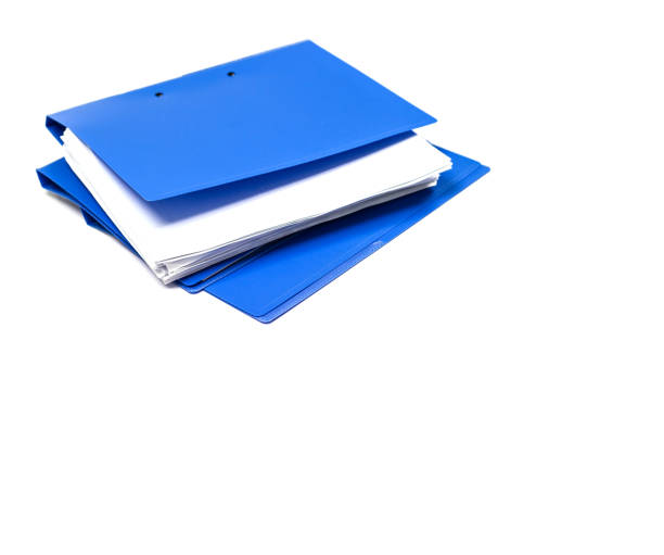 istock file folder and Stack of business report paper 1034333956