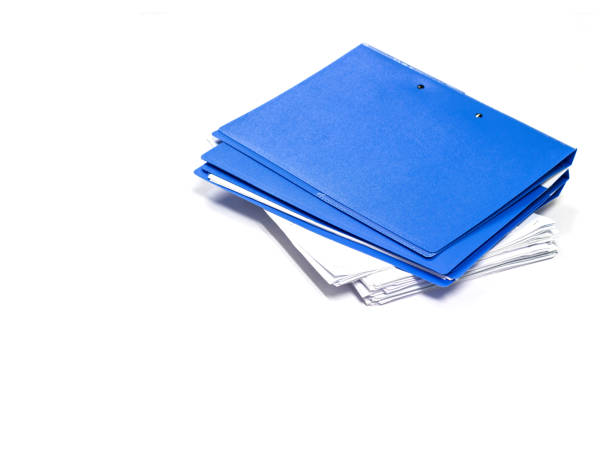 istock file folder and Stack of business report paper 1034334068
