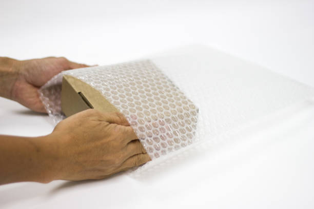 istock hand man hold bubble pack, for Packing and protection product cracked 1034334310