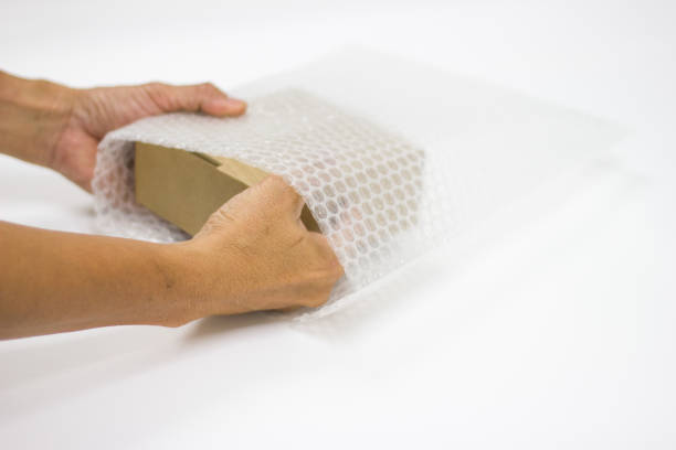 istock hand man hold bubble pack, for Packing and protection product cracked 1034334378