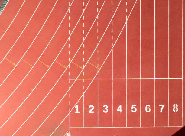 istock Running track at the stadium, color is orange brick, high angle view by drone. 1034338186