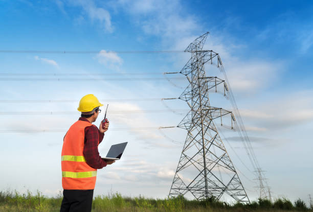 istock Electrician work installation of high voltage in high voltage stations safely 1034338276