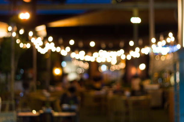 blur image of night festival in a restaurant and The atmosphere is happy and relaxing stock photo