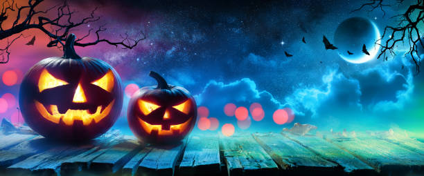 istock Halloween Pumpkins Glowing In Fantasy Night 1034341658