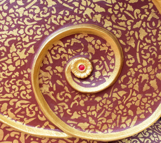istock Spiral pattern with the golden painting. 1034342642