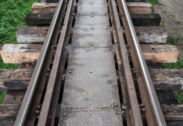 istock Old railway line with the metal board walkway. 1034342686